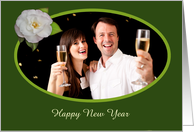 Happy New Year, white Camellia on green background.photo frame. card