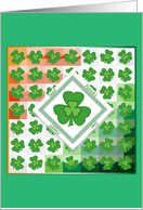 shamrock on shade of green and orange background happy St Patrick’s day card