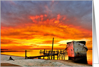 Bright Red Yellow Sunrise over Boat Ship Wreck card