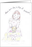Girl Opening Birthday Present with Puppy Inside card
