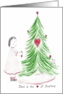 Girl Decorating Christmas Tree with Hearts card