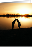 Kissing couple in Sunset card