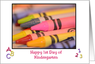 Happy 1st Day of Kindergarten, white background with colorful crayons framed in black card