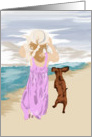 Girl and puppy friends at the ocean card