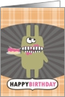 Cute funny monster eating your birthday cake card