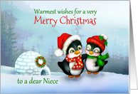 Merry Christmas to Niece, Penguins in Santa Hats in Snow with Igloo card