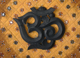 OM wooden carving...