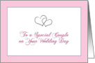 Silver tone hearts for a special couple on their wedding day card