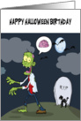 Halloween birthday humor, ugly green zombie in cemetery, brains, bat, card