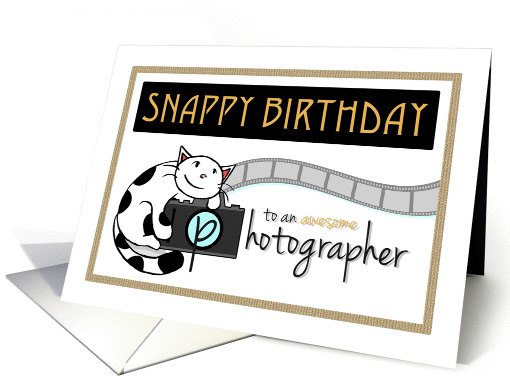 Happy birthday to photographer, Cute cat hugs camera card (1424896)