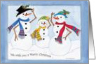 Snow family with scarves,hats and holly card