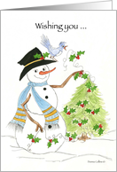 Snowman decorating pine tree with holly card