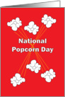 National Popcorn Day, with Kernels of Popping Popcorn on Red card