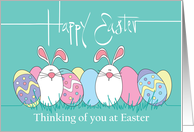 Thinking of you at Easter, Row of Colored Eggs and White Bunnies card