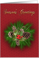 Season’s Greetings holly and pine cones on red texture card