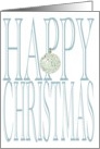 A patterned glass bauble hanging from a huge Christmas greeting card