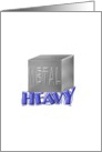 Block of metal sitting on ’heavy’ letters, heavy metal card
