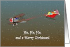 Male Pilot In Biplane Towing Santa In His Sleigh card