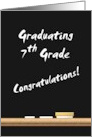 7th Grade Graduation Congratulations Written on Blackboard card