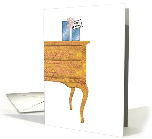 Birthday present sitting on top of chest of drawers card (1046793)