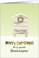 Christmas for beekeeper, beehive decorated with holiday wreath card