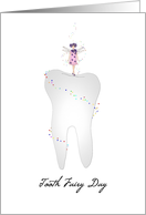 Tooth Fairy Day, fairy standing on a tooth sprinkled with fairy dust card