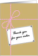 Thank you for your order, string tied package with label, business card