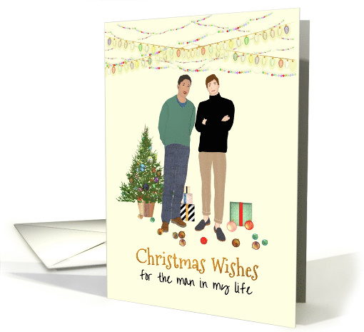 Interracial Couple Beside Christmas Tree Baubles and... (1592562)