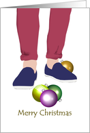 Christmas, Man’s legs and feet in slippers, with ornaments on floor card