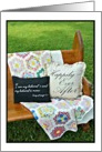 Church pew with vintage blanket and pillows for wedding day card