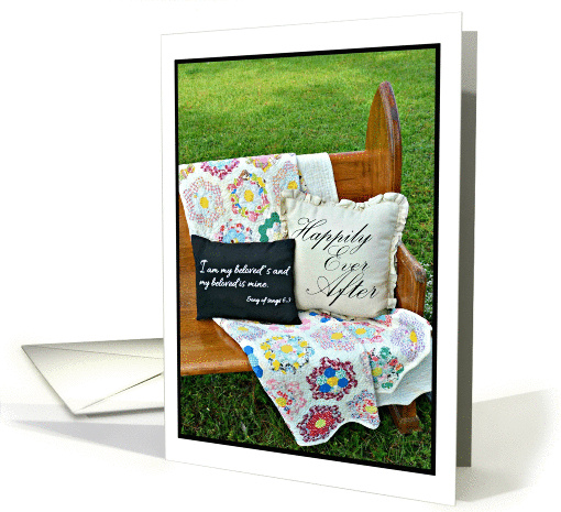 Church pew with vintage blanket and pillows for wedding day card