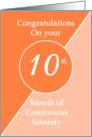 Congratulations 10 months continuous sobriety. Light and dark orange card