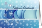 Snow crystals on blue banners Season’s Greetings card