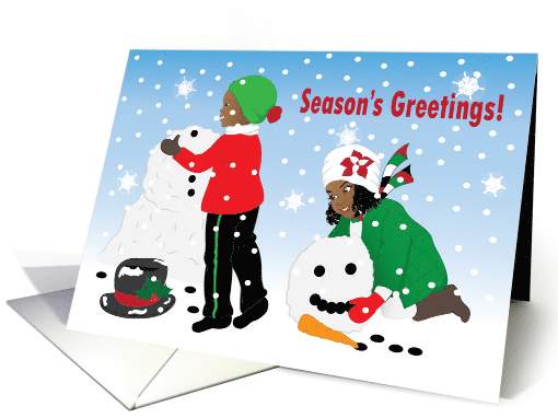 Christmas - Boy and girl having fun building a snowman card (959645)
