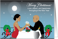 Black Couple toast with champagne to celebrate Christmas card