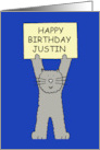Happy Birthday Justin Cartoon Grey Cat Holding Up a Banner card