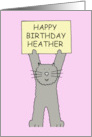 Happy Birthday Heather Cartoon Grey Cat Holding a Banner card