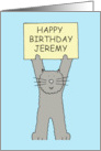 Happy Birthday Jeremy Cute Cartoon Grey Cat Holding a Banner card