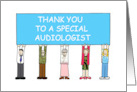 Thank You Audiologist Cartoon Group Holding a Banner card