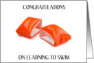 Congratulations on Learning to Swim Orange Arm Floats card