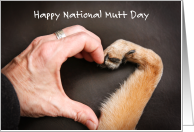 National Mutt Day Dog Paw and Human Hand Forming a Heart Shape card