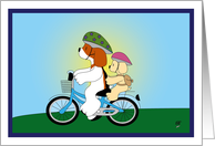 Two dogs riding a bicycle card