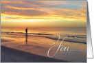 You are not alone card with person walking on the beach at sunset. card