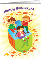 Happy Hanukkah Card for Kids with Children Riding a Dreidel card