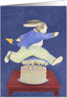 Young Male Rabbit Jumping Over Birthday Cake Card