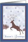 Reindeer Jumping on a Snowy Day for Christmas card