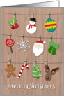 Clothes Line with Christmas Elements in Front of a Wood Background card