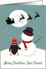 Snowman and Penguin Watch Santas Sleigh for Christmas card