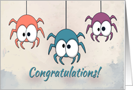 Three Colorful Spiders with a Watercolor Background for Congratulation card