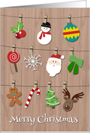 Clothes Line with Christmas Elements in Front of a Wood Background card